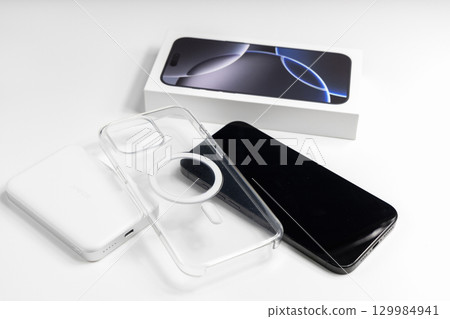 High-tech smartphone with magnetic case and powerbank High-tech smartphone with magnetic case and powerbank 129984941