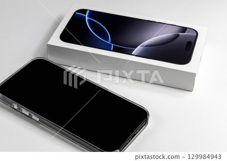 Brand new smartphone in retail box Brand new smartphone in retail box 129984943