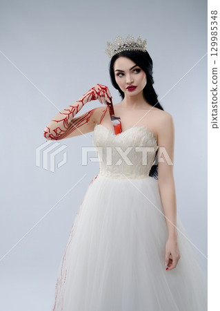 Bridal beauty with a sinister twist in a hauntingly elegant display 129985348