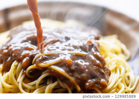 Delicious pasta ingredients that shine in the light Delicious pasta ingredients that shine in the light 129985889