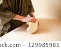 Handmade udon dough making 129985981