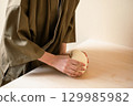 Handmade udon dough making 129985982