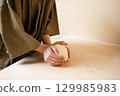 Handmade udon dough making 129985983