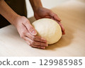 Handmade udon dough making 129985985