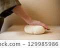 Handmade udon dough making 129985986