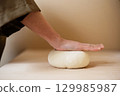 Handmade udon dough making 129985987