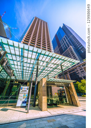 Tokyo cityscape, Japan, August 21. View of Nihonbashi Station (Exit B6) and Tokyo Nihonbashi Tower. 129986649