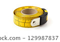 Yellow Measuring Tape on White Background for Measurement Purposes 129987837