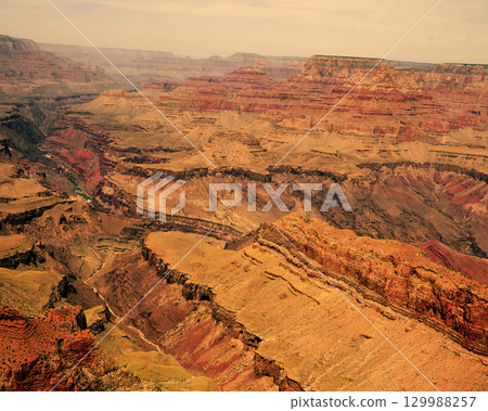 Sunset Hazy Sky Day At The Grand Canyon Arizona 129988257
