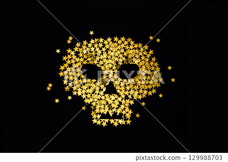 Symbol of gold glitter skull on dark black with sparkles. Halloween party concept. 129988703
