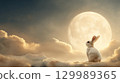 A rabbit on a cloud bathed in the light of the full moon 129989365