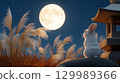 Beautiful Japanese autumn scenery with a full moon, pampas grass and rabbits 129989366
