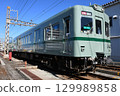 Nankai Electric Railway 2200 series train (Southern/Wakayama Port sign) parked at the depot 129989858