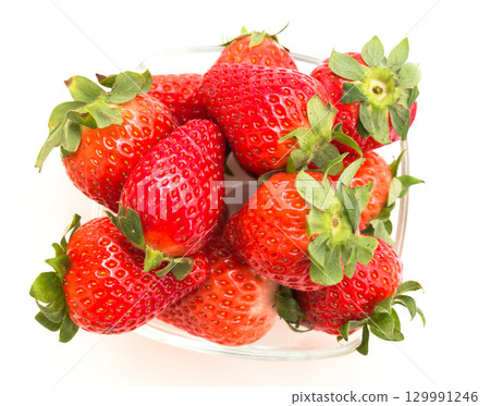 fresh appetizing strawberries on a white background fresh appetizing strawberries on a white background 129991246