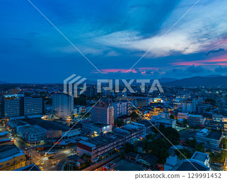 aerial view beautiful pink cloud in sky at twilight above Phuket city. 129991452