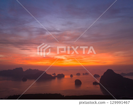 Imagine the beautiful bright red sky at sunrise from a bird's eye view. 129991467