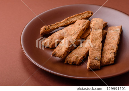 Biscotti or cantuccini biscuits, a crispy sweet Italian pastry. Biscotti dessert 129991501