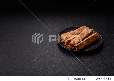 Biscotti or cantuccini biscuits, a crispy sweet Italian pastry. Biscotti dessert Biscotti or cantuccini biscuits, a crispy sweet Italian pastry. Biscotti dessert 129991513