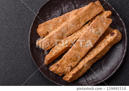 Biscotti or cantuccini biscuits, a crispy sweet Italian pastry. Biscotti dessert 129991518