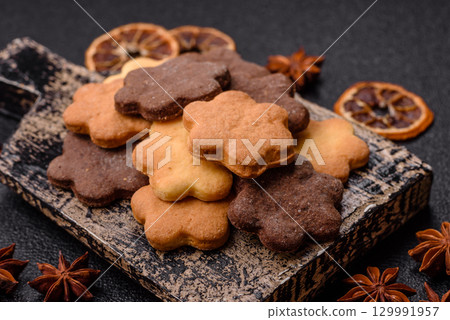 Sweet crispy biscuit with cocoa flavor, baking at home. Biscuit as a dessert Sweet crispy biscuit with cocoa flavor, baking at home. Biscuit as a dessert 129991957