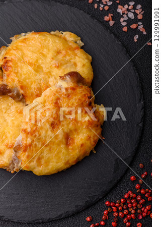 Steak, a pork or chicken chop covered with melted cheese. Grilled meat 129991991