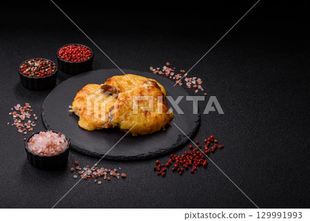 Steak, a pork or chicken chop covered with melted cheese. Grilled meat 129991993