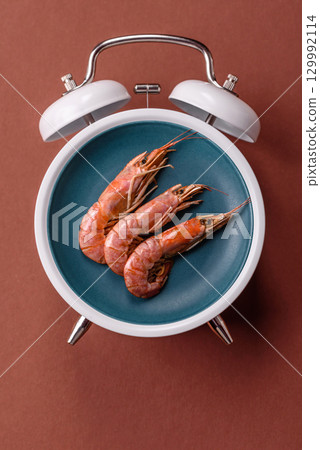 Cooked shrimp, prawn, meal, fresh seafood. Time to eat prawns Cooked shrimp, prawn, meal, fresh seafood. Time to eat prawns 129992114