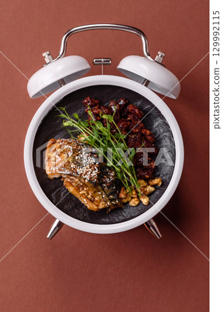 Grilled mackerel fish with peppers and spices. Concept time to eat fish 129992115