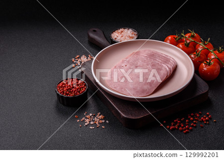Sliced ham, meat or pork sausage for sandwiches. Cooked smoked prosciutto, ham 129992201