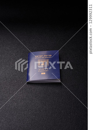 Israel passport for travelling, flying and doing business. Israeli document, id 129992311