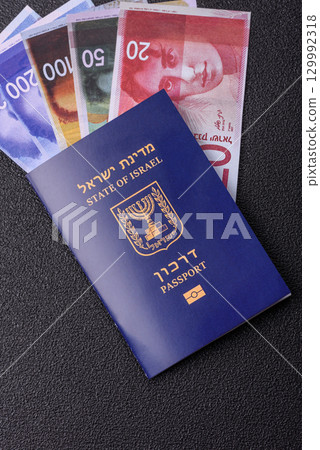 Israel passport for travelling, flying and doing business. Israeli document, id Israel passport for travelling, flying and doing business. Israeli document, id 129992318