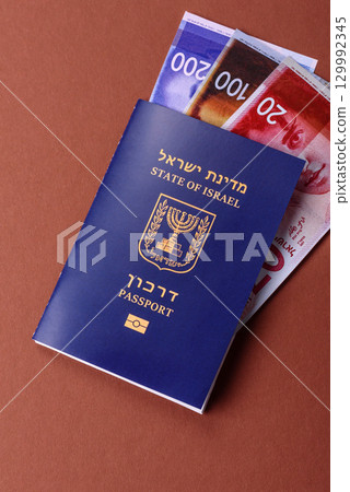 Israel passport for travelling, flying and doing business. Israeli document, id Israel passport for travelling, flying and doing business. Israeli document, id 129992345