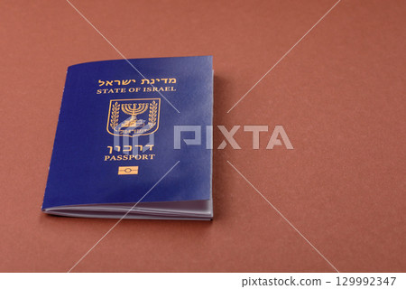 Israel passport for travelling, flying and doing business. Israeli document, id 129992347