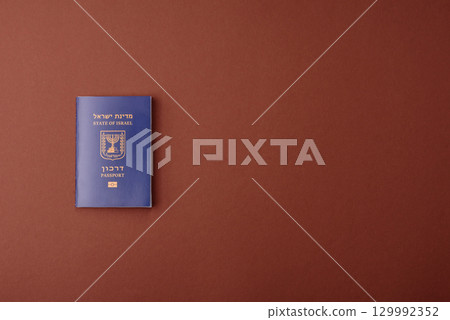 Israel passport for travelling, flying and doing business. Israeli document, id Israel passport for travelling, flying and doing business. Israeli document, id 129992352
