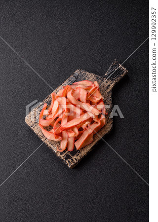 Food, dried squid in shavings or chopped as snacks or jerky. Snack dried squid for beer Food, dried squid in shavings or chopped as snacks or jerky. Snack dried squid for beer 129992357