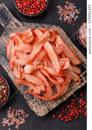 Food, dried squid in shavings or chopped as snacks or jerky. Snack dried squid for beer Food, dried squid in shavings or chopped as snacks or jerky. Snack dried squid for beer 129992365
