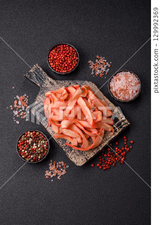 Food, dried squid in shavings or chopped as snacks or jerky. Snack dried squid for beer Food, dried squid in shavings or chopped as snacks or jerky. Snack dried squid for beer 129992369