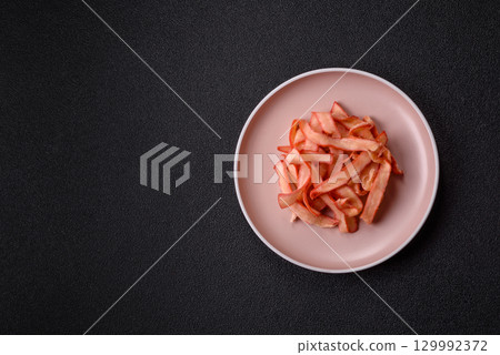 Food, dried squid in shavings or chopped as snacks or jerky. Snack dried squid for beer Food, dried squid in shavings or chopped as snacks or jerky. Snack dried squid for beer 129992372