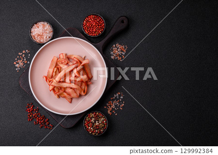 Food, dried squid in shavings or chopped as snacks or jerky. Snack dried squid for beer 129992384