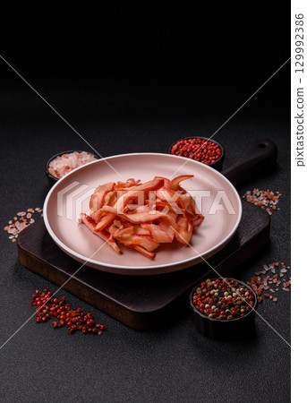 Food, dried squid in shavings or chopped as snacks or jerky. Snack dried squid for beer 129992386