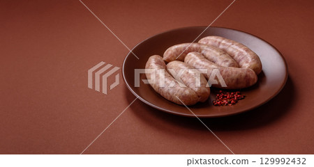 Raw meat sausages made from beef or pork, fresh meat for barbecuing or grilling. Raw sausages Raw meat sausages made from beef or pork, fresh meat for barbecuing or grilling. Raw sausages 129992432