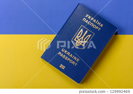 Ukrainian passport for travelling, flying and doing business. Ukraine document Ukrainian passport for travelling, flying and doing business. Ukraine document 129992469