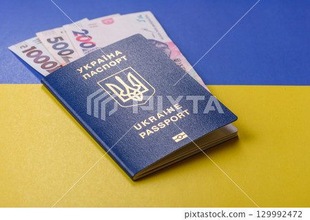Ukrainian passport for travelling, flying and doing business. Ukraine document Ukrainian passport for travelling, flying and doing business. Ukraine document 129992472