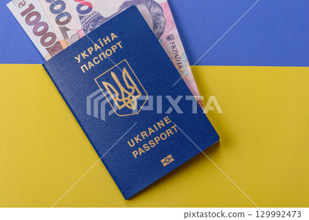 Ukrainian passport for travelling, flying and doing business. Ukraine document Ukrainian passport for travelling, flying and doing business. Ukraine document 129992473