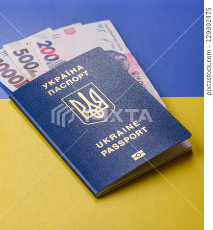 Ukrainian passport for travelling, flying and doing business. Ukraine document Ukrainian passport for travelling, flying and doing business. Ukraine document 129992475