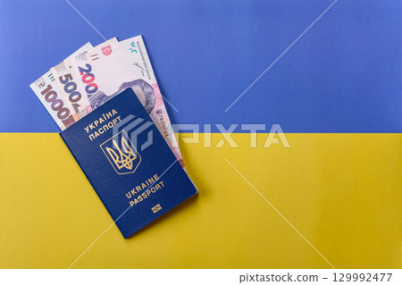 Ukrainian passport for travelling, flying and doing business. Ukraine document Ukrainian passport for travelling, flying and doing business. Ukraine document 129992477