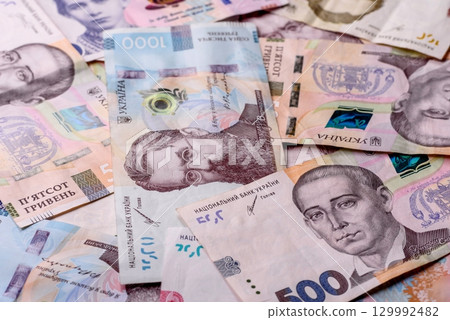 Ukrainian money, hryvnia, paper banknotes, cash. Ukrainian money for business Ukrainian money, hryvnia, paper banknotes, cash. Ukrainian money for business 129992482