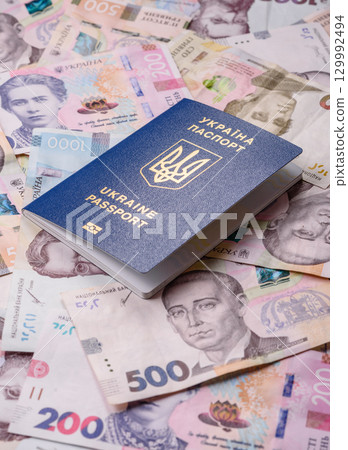 Ukrainian passport for travelling, flying and doing business. Ukraine document 129992494