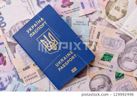 Ukrainian passport for travelling, flying and doing business. Ukraine document Ukrainian passport for travelling, flying and doing business. Ukraine document 129992496