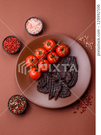 Snacks or jerky, beef slice meat dried, dehydrated. Beef snack Snacks or jerky, beef slice meat dried, dehydrated. Beef snack 129992506